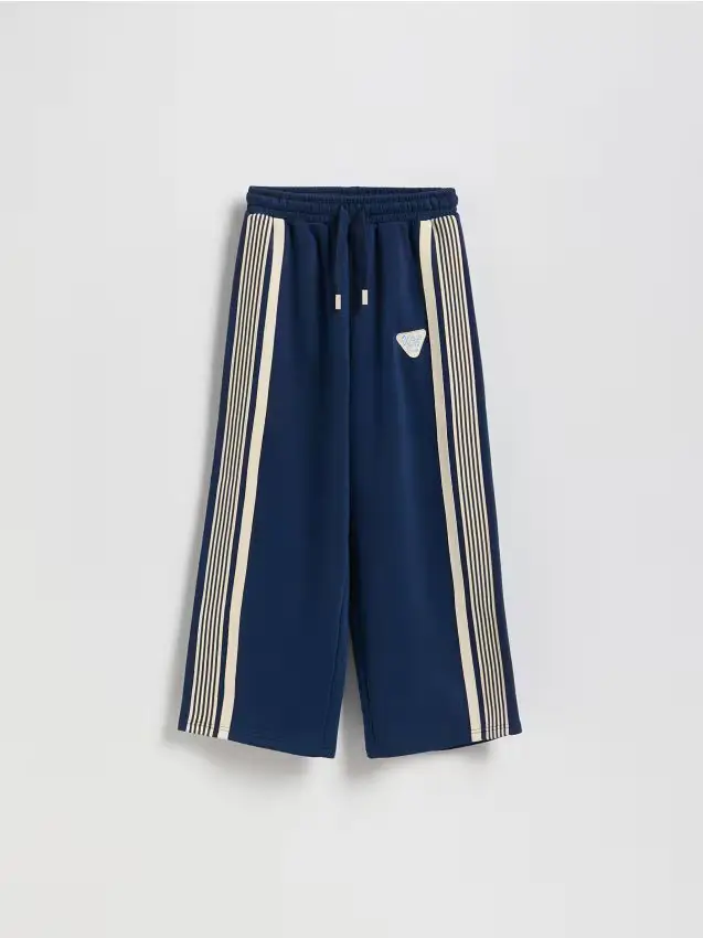 Pantaloni da tuta con banda laterale - blu scuro