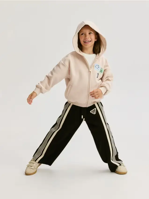 Pantaloni da tuta con banda laterale - nero