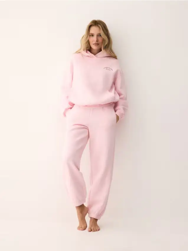 Pantaloni da tuta con polsini - rosa pastello