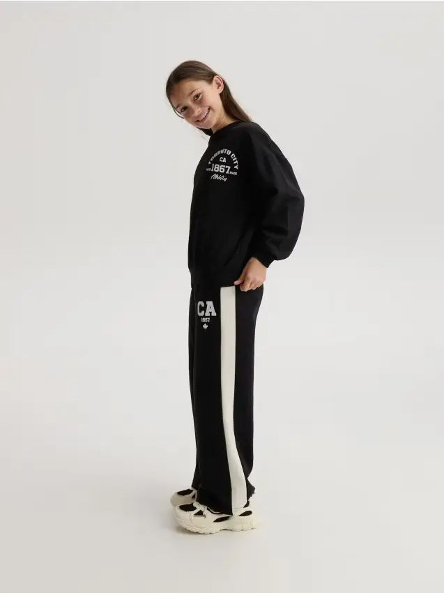 Pantaloni da tuta con strisce laterali - nero