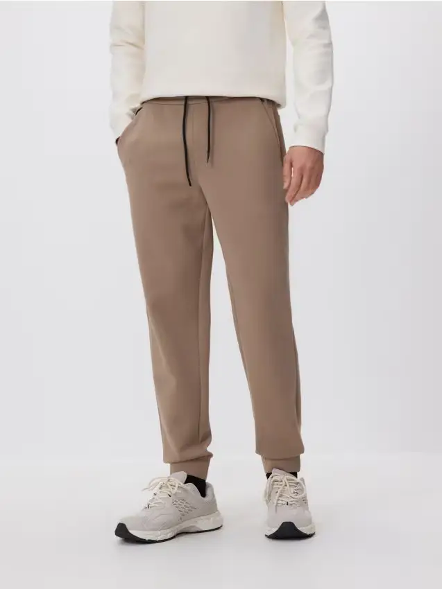 Pantaloni da tuta slim fit - beige