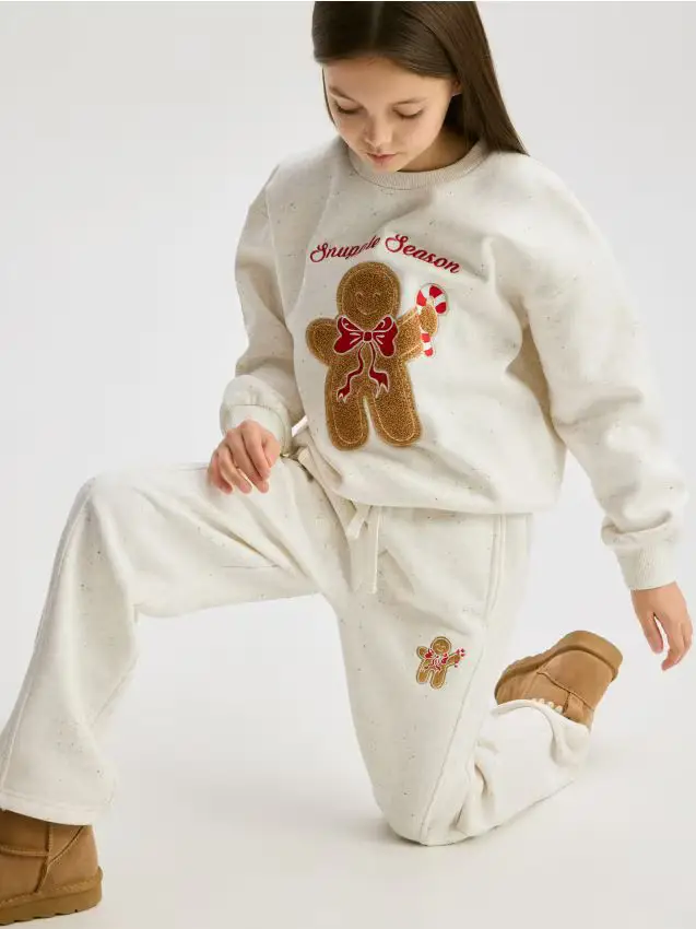 Pantaloni della tuta con ricamo natalizio - panna