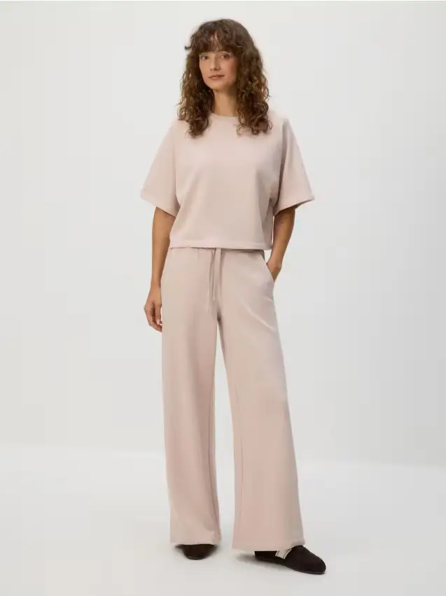 Pantaloni della tuta in cotone - rosa pastello