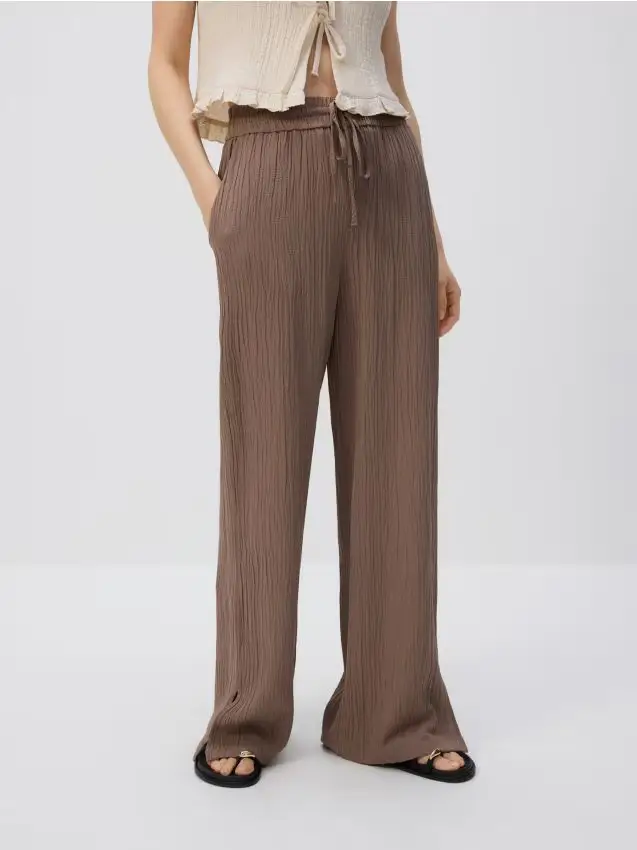 Pantaloni effetto stropicciato - beige