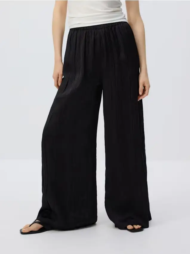 Pantaloni effetto stropicciato - nero