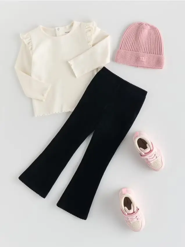 Pantaloni flare di velluto a coste - nero