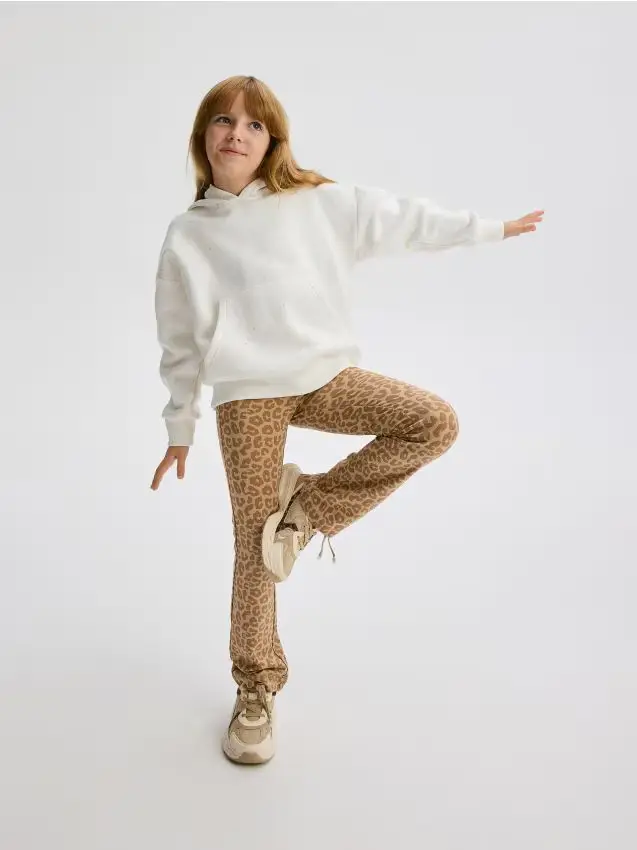 Pantaloni flare fantasia - beige