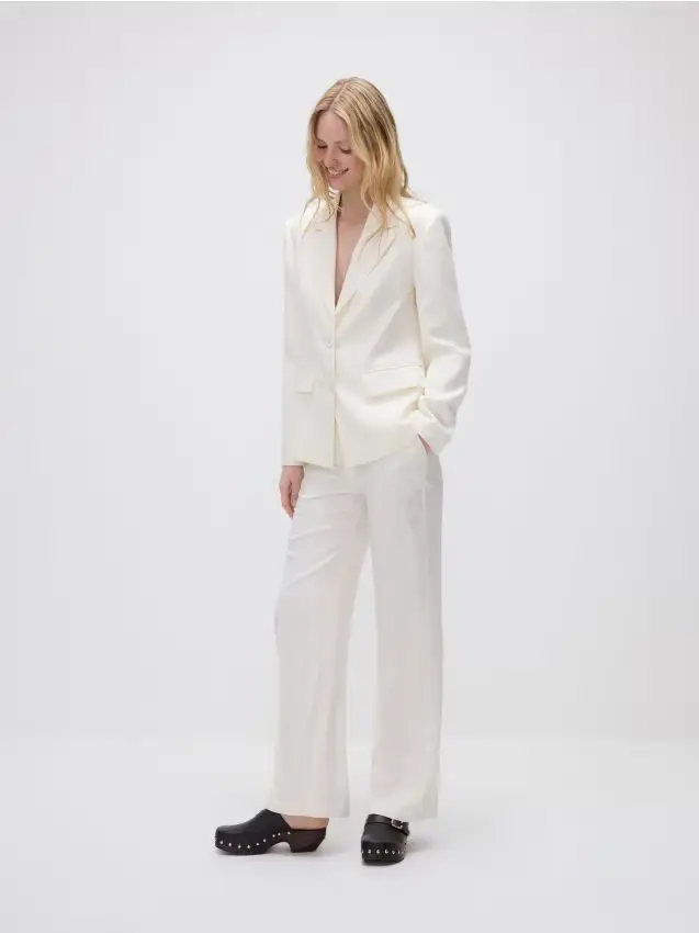 Pantaloni in jacquard con piega stirata - panna