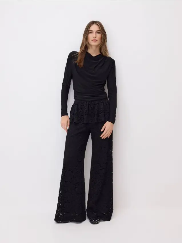 Pantaloni in pizzo con peplum - nero