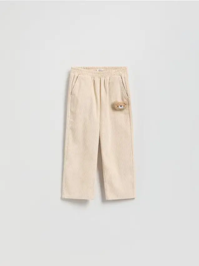 Pantaloni in velluto a coste con applicazione - nude