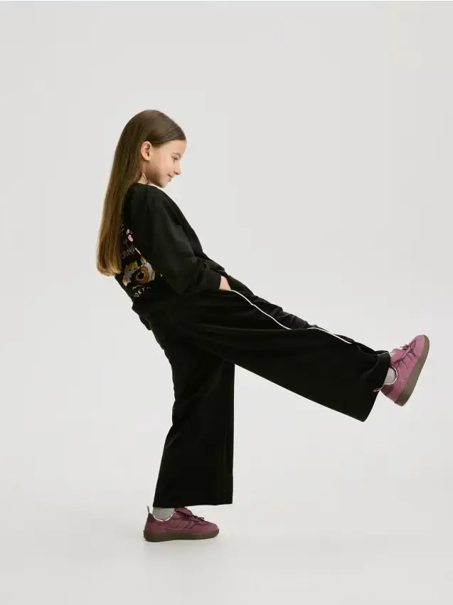 Pantaloni in velour a gamba ampia - nero