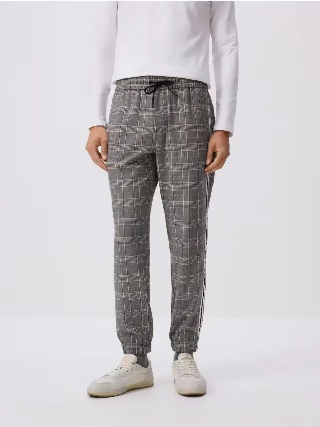 Pantaloni jogger con bande laterali - grigio medio