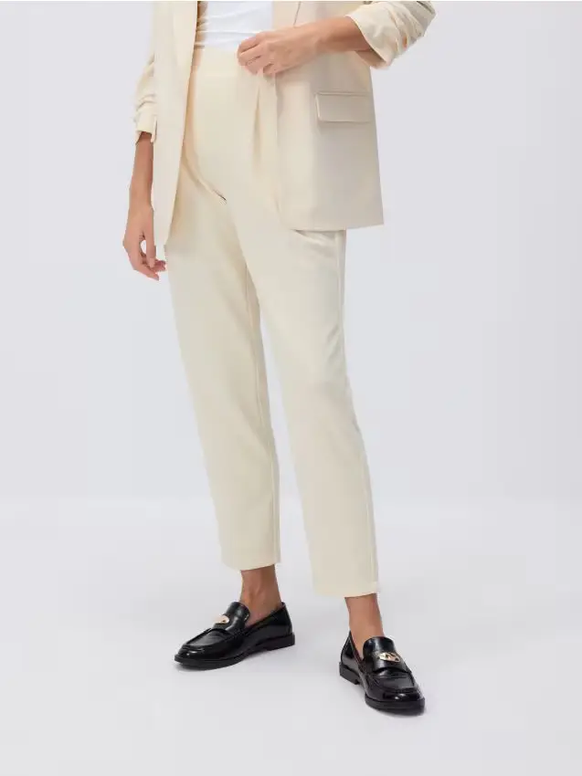 Pantaloni jogger con pinces - giallo chiaro