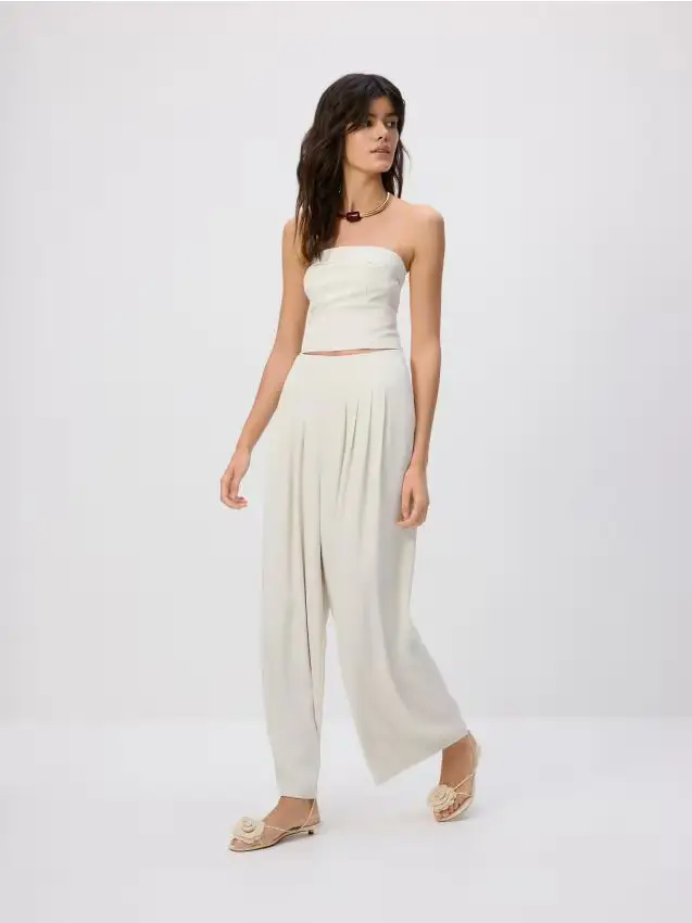 Pantaloni larghi con pinces - panna