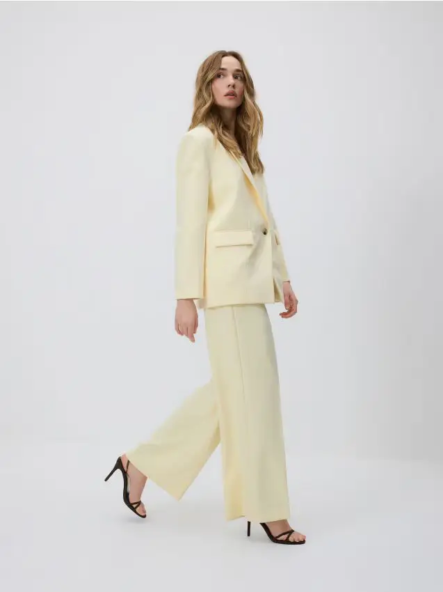 Pantaloni larghi - giallo chiaro