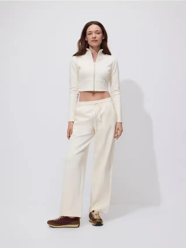 Pantaloni sportivi a gamba larga - giallo chiaro