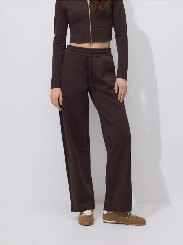 Pantaloni sportivi a gamba larga - marrone scuro