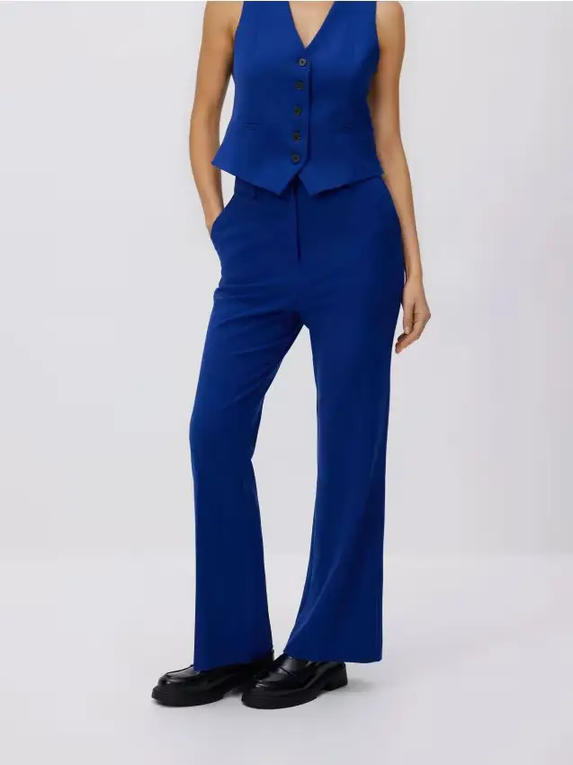 Pantaloni svasati flare con piega - indaco