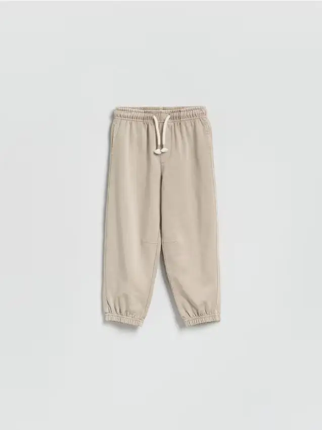 Reserved Pantaloni tuta effetto slavato - beige