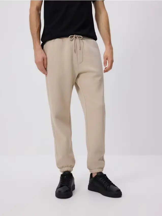 Pantaloni tuta regular fit - beige