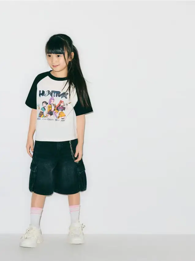 Shorts in denim con catena - nero