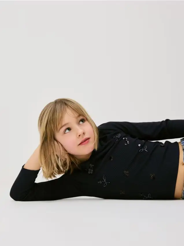 T-shirt con applicazione a paillette - nero