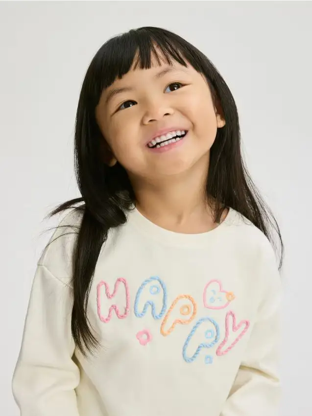 T-shirt con stampa ricamata - panna