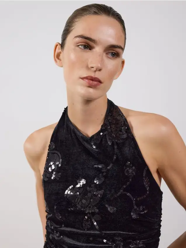 Top halter con paillettes - nero