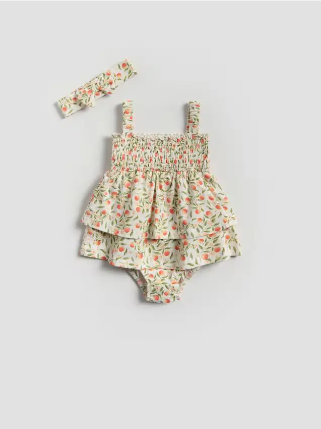 Tuta floreale con fascia - panna