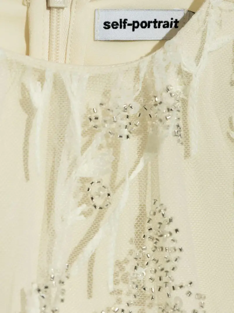 Abito crema in tulle e macramè miniatura 2