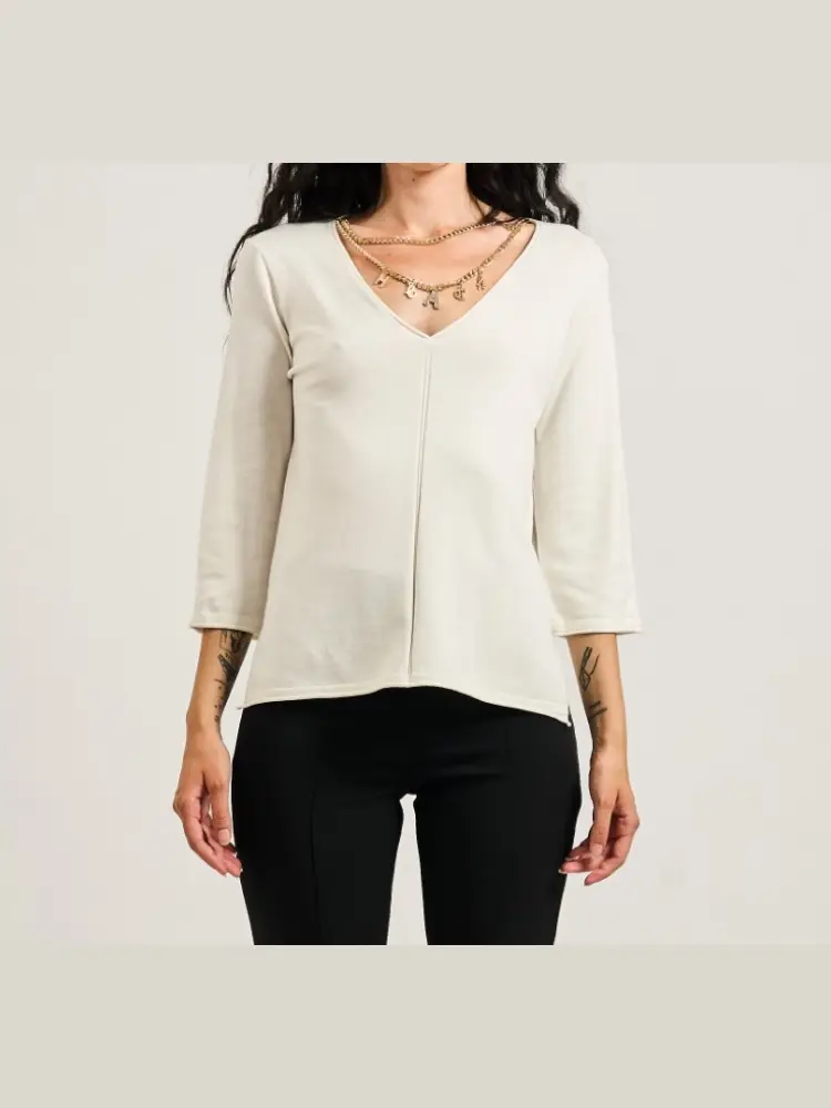 maglia sanke con catena decorativa panna