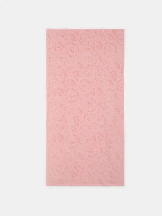 Asciugamano con motivo floreale in rilievo - rosa cipria