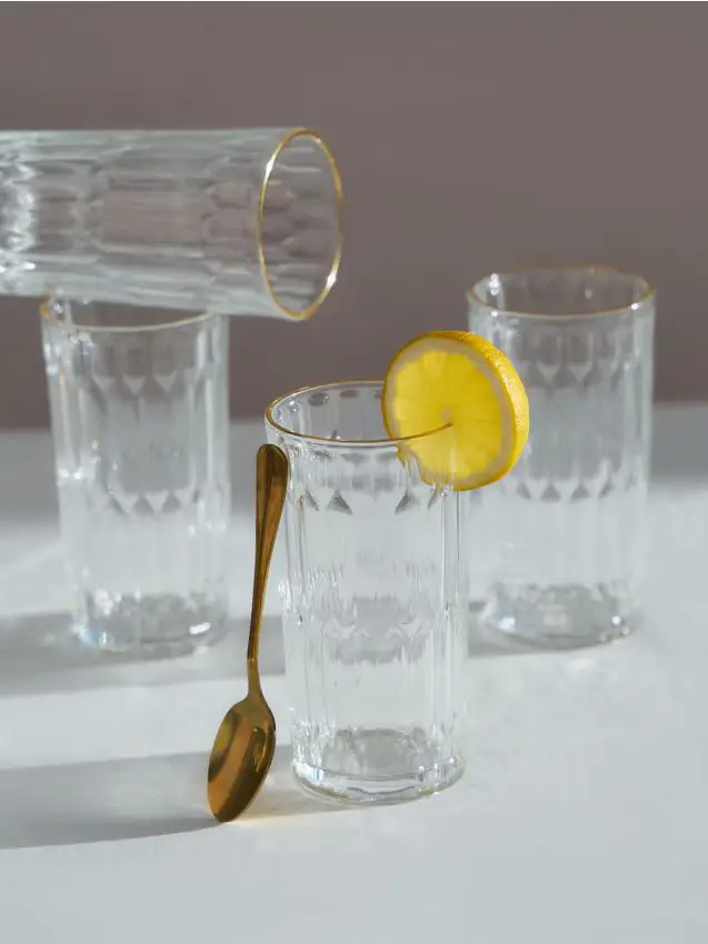 Bicchieri decorativi con texture e bordo dorato 4 pack - clear