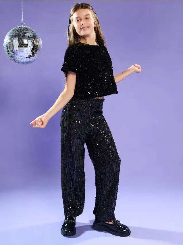 Blusa elegante con paillettes luccicanti - nero