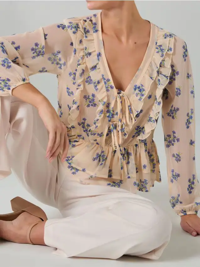 Blusa semitrasparente con motivo floreale - giallo chiaro