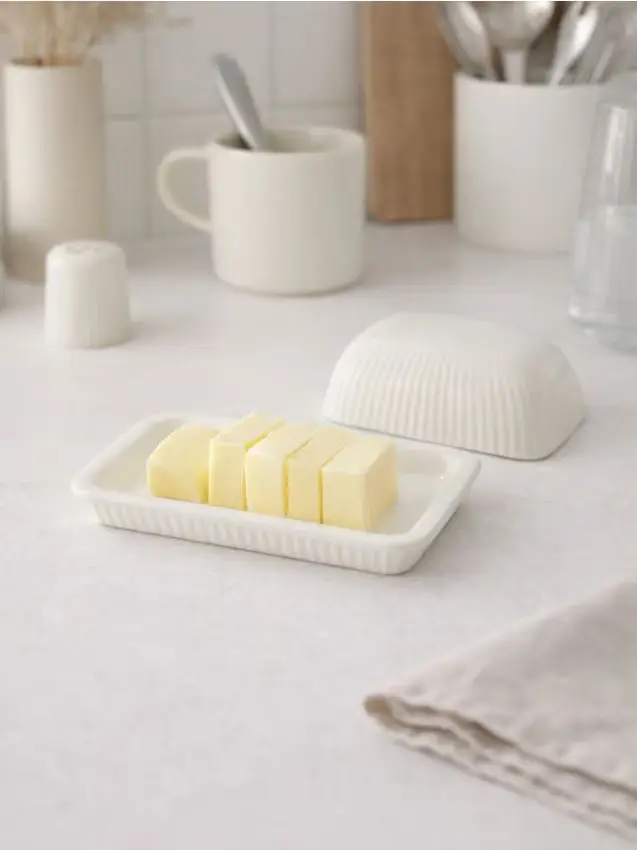 Burriera in ceramica con superficie scanalata - panna