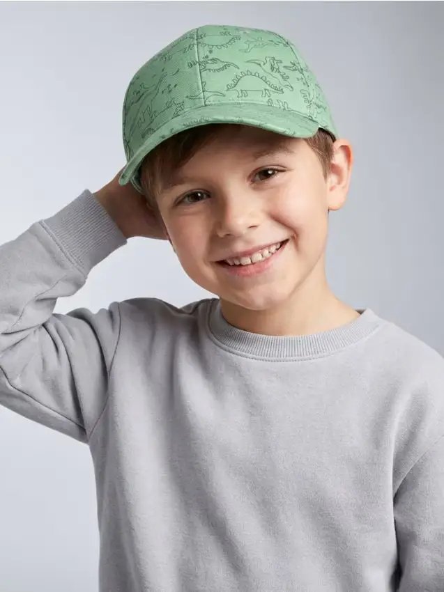 Cappellino con visiera in cotone con motivo dinosauri - verde