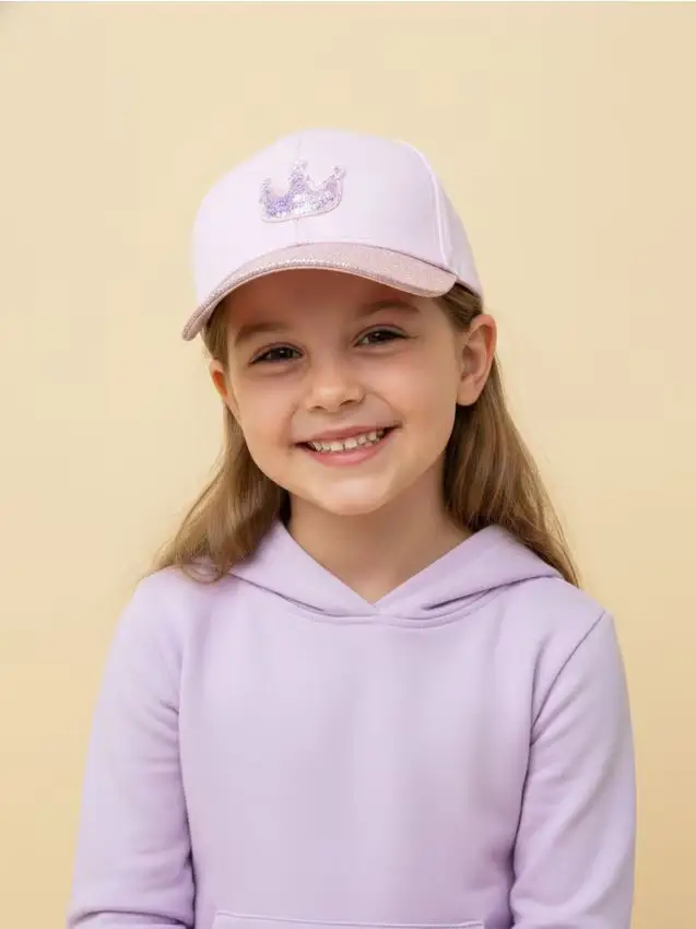 Cappellino in cotone con visiera glitterata e motivo a corona - rosa