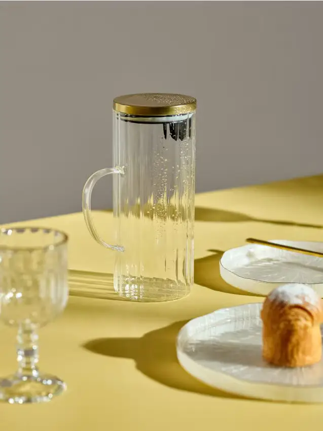 Caraffa scanalata con manico - clear