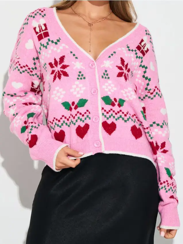 Cardigan natalizio con motivo di stella di Natale e cuoricini - multicolor