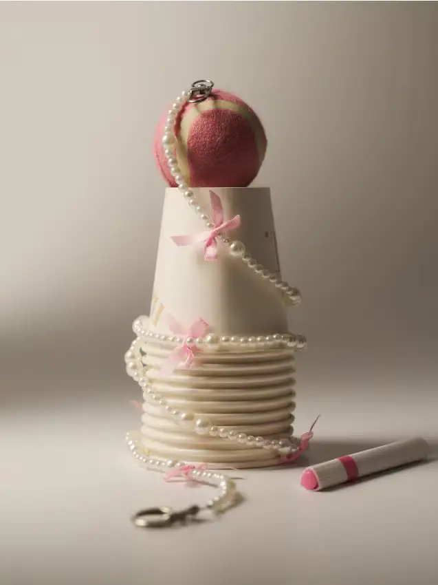 Catenella per telefono con perle e fiocchetti - rosa