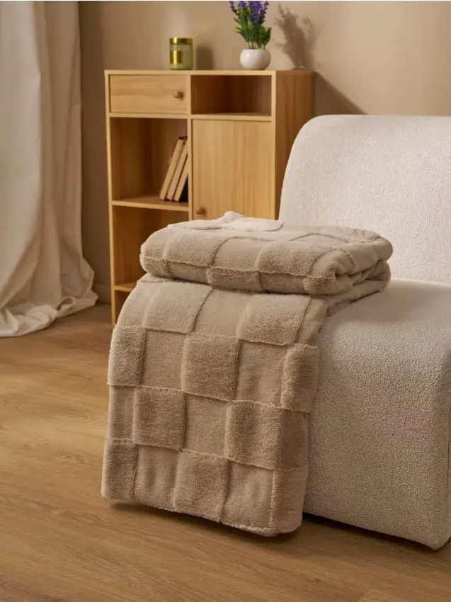 Coperta con motivo goffrato a scacchiera - beige