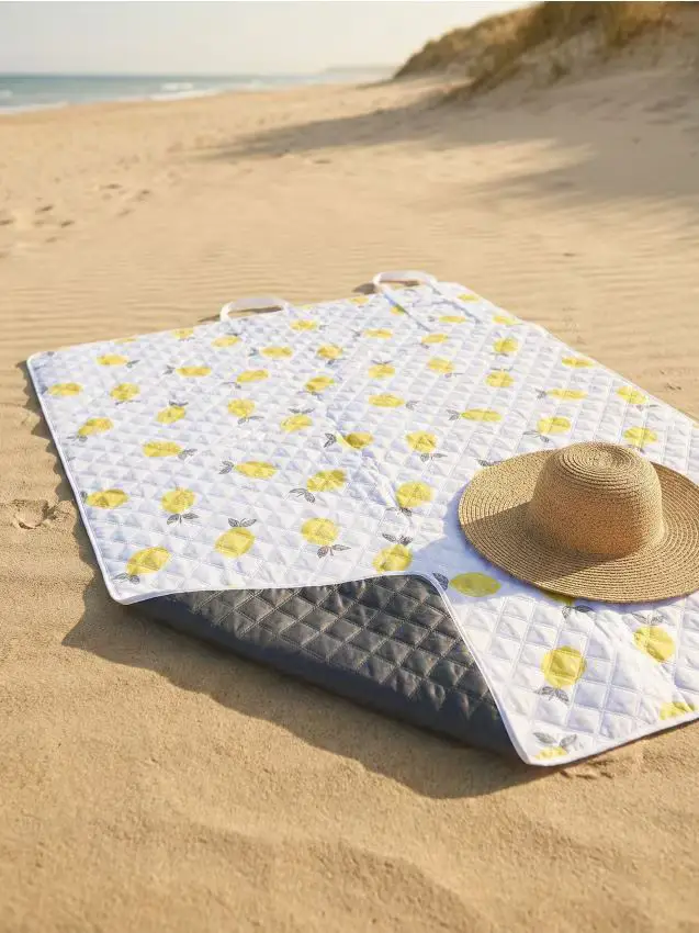 Coperta da picnic con motivo di limoni - panna