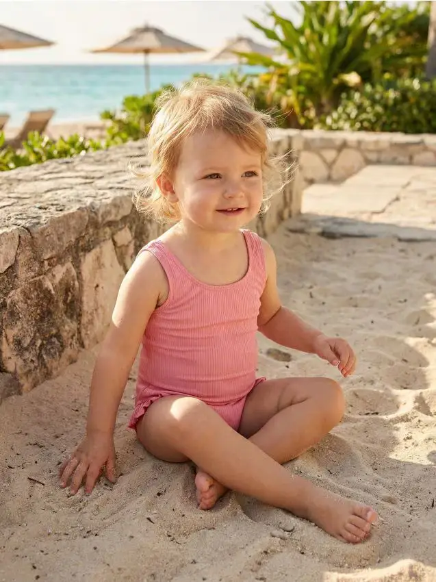 Costume da bagno in tessuto a costine con volant - rosa