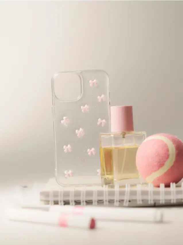 Cover per iPhone 15 con motivo a fiocco - rosa