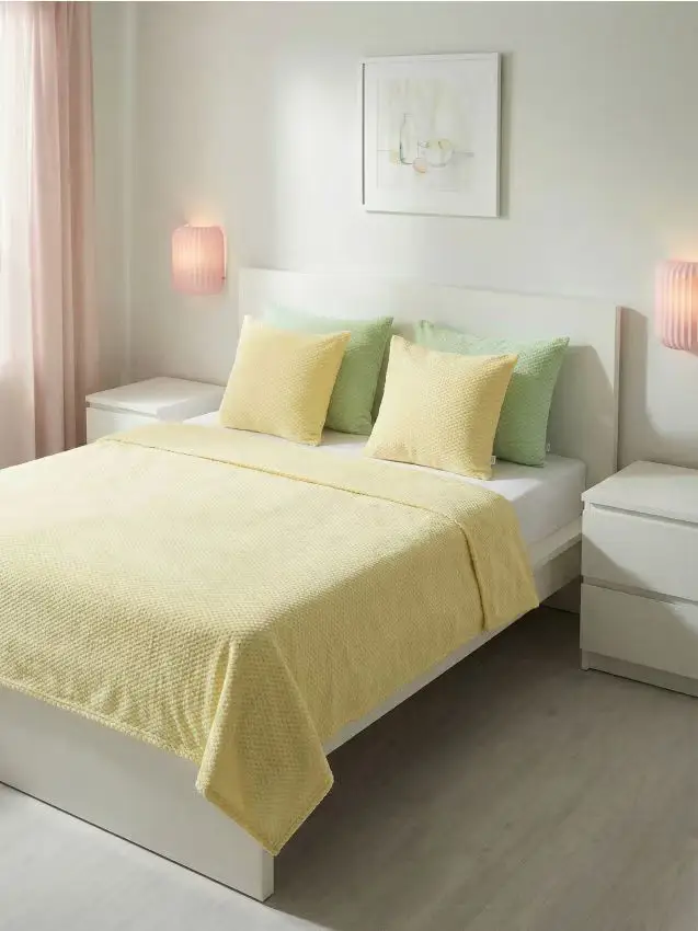 Cuscino con motivo in rilievo - giallo chiaro