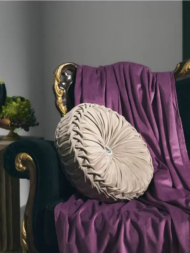 Cuscino rotondo con finitura in velluto - beige