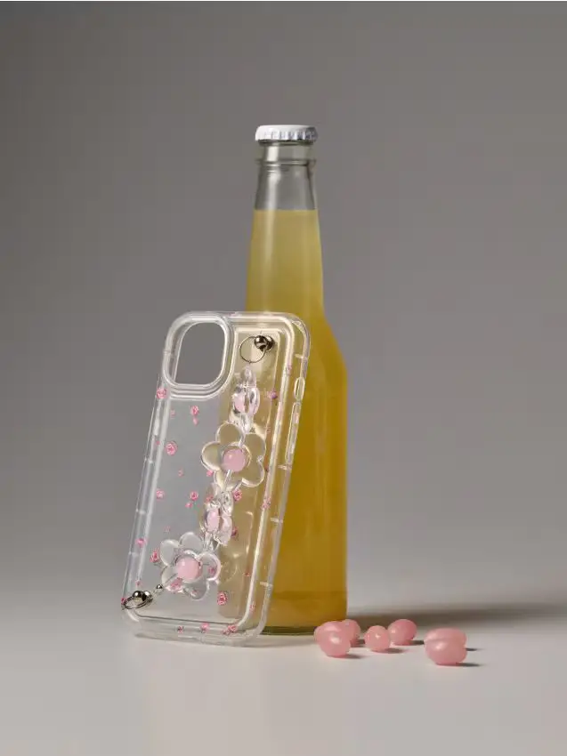 Custodia trasparente per iPhone 13/14 con motivo floreale e ciondolo a forma di fiore - multicolor