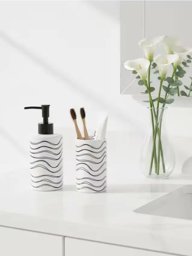 Dispenser per sapone e bicchiere per spazzolini in dolomite con motivo a onde - bianco