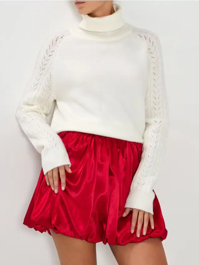 Dolcevita con maniche decorative - bianco